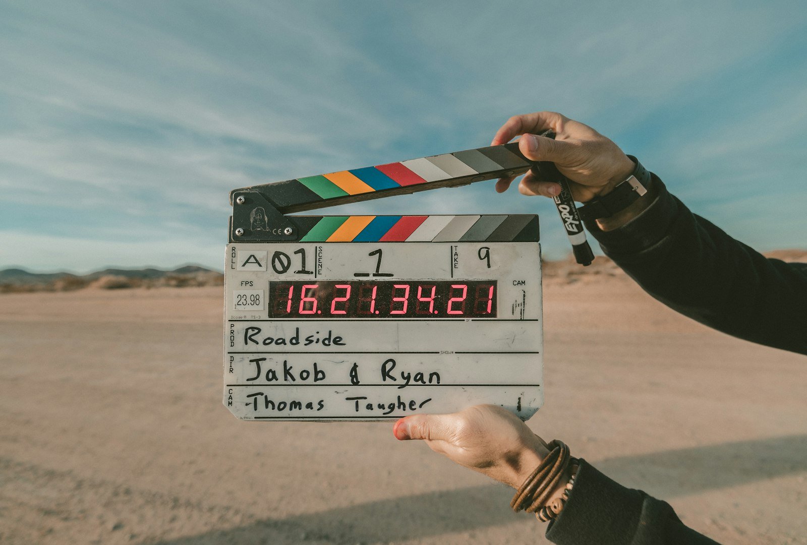 Clapperboard held up on a film shoot